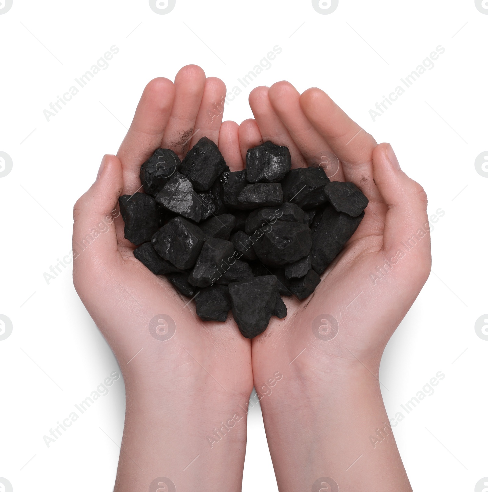 Photo of Woman with handful of coal on white background, top view
