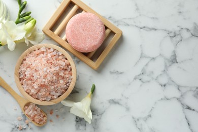 Photo of Flat lay composition with different spa products on white marble table. Space for text