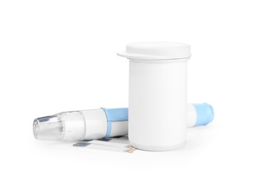 Photo of Lancet pen, container and test strips Diabetes control