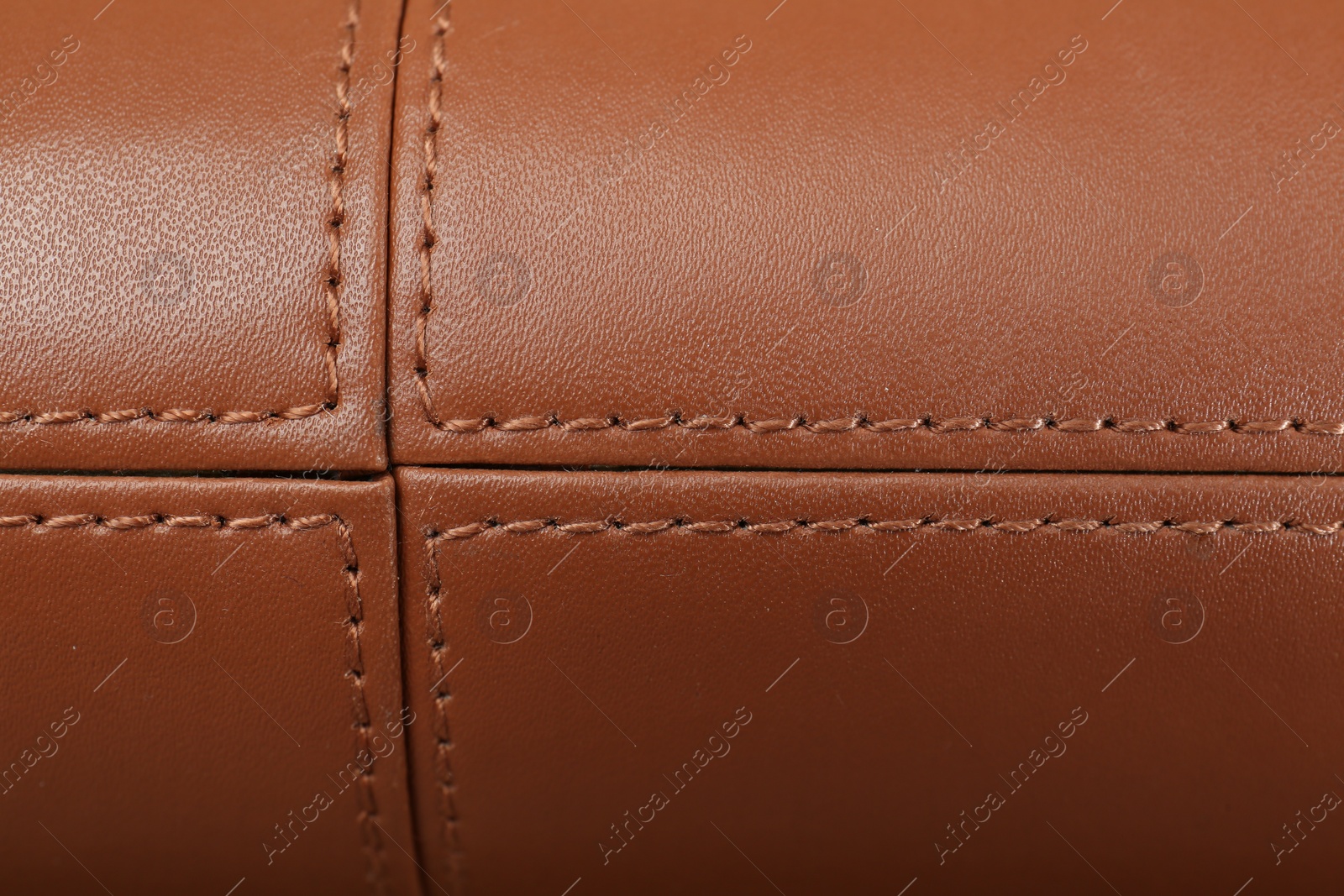 Photo of Texture of brown leather as background, top view