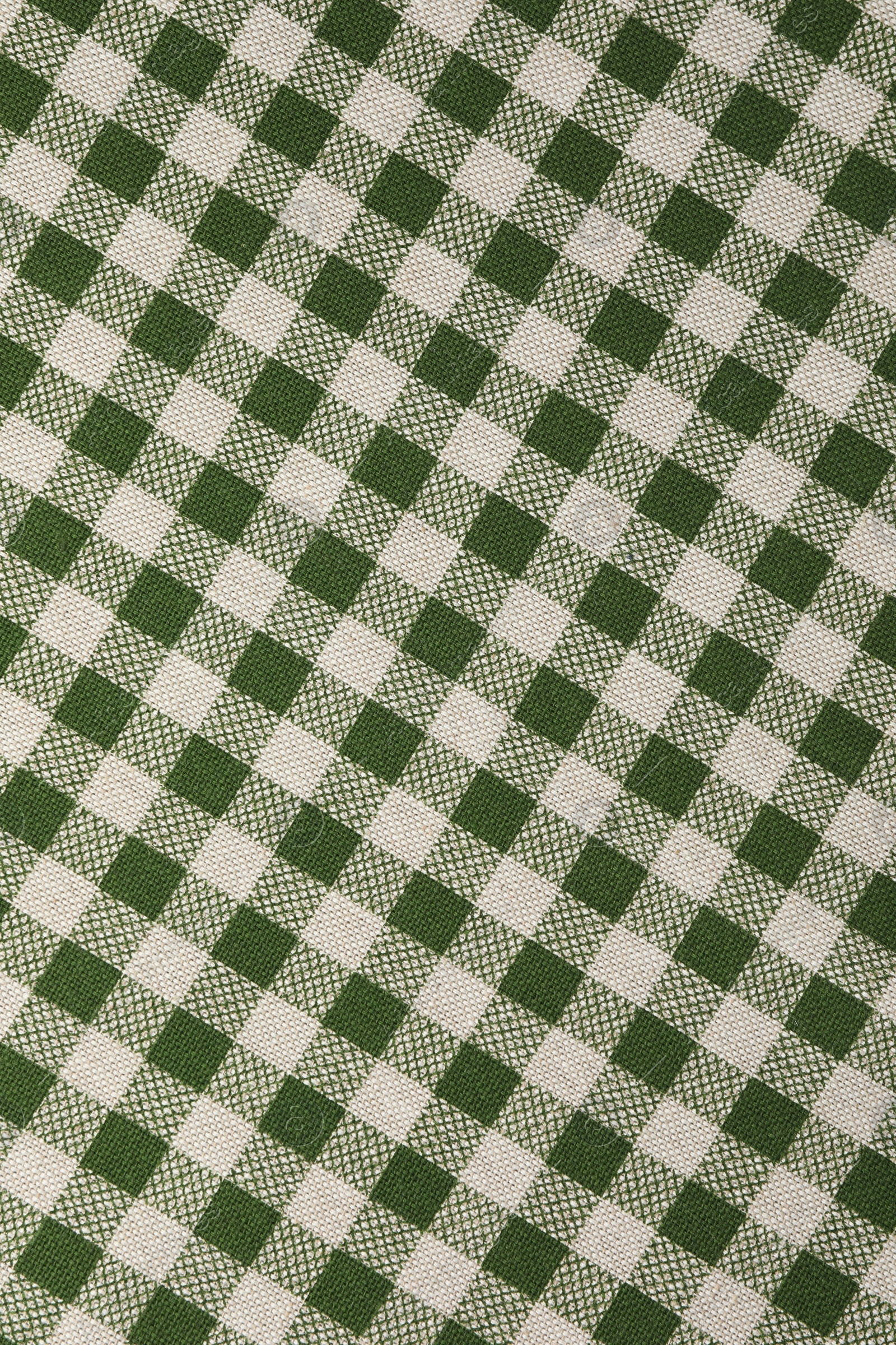 Photo of Texture of checkered fabric as background, top view