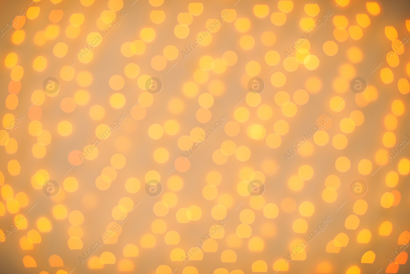 Photo of Beautiful gold lights as background. Bokeh effect