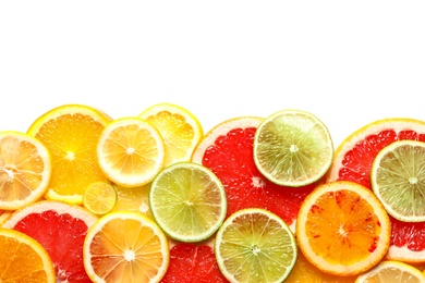 Slices of fresh citrus fruits on white background, top view