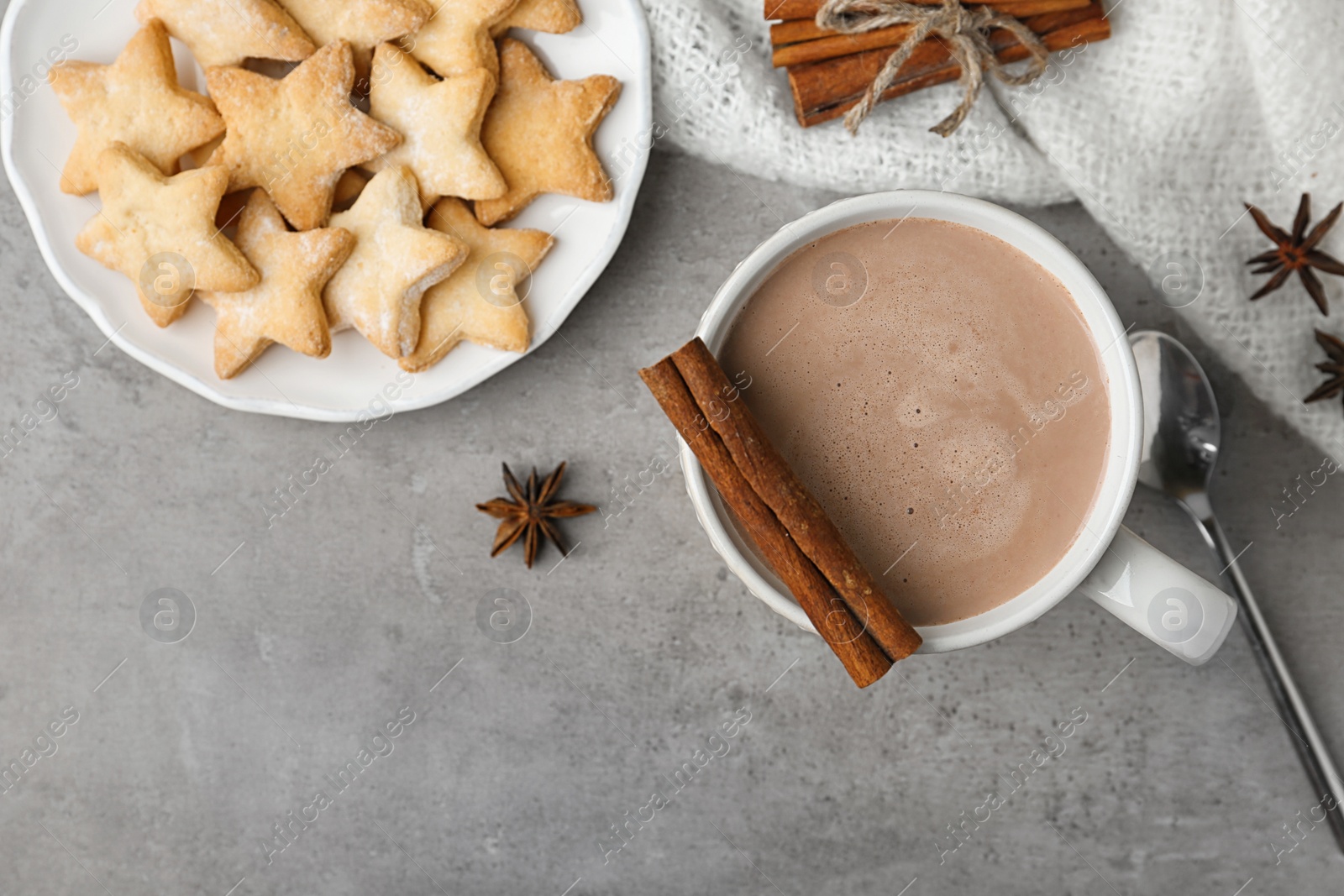 Photo of Composition with delicious hot cocoa drink and cookies on grey background, flat lay