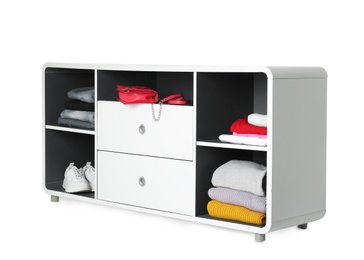 Photo of Stylish shelving unit with clothes and shoes on white background. Furniture for wardrobe room