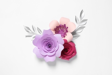 Photo of Different beautiful flowers and branches made of paper on white background, top view