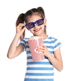 Photo of Cute little girl with popcorn and glasses on white background