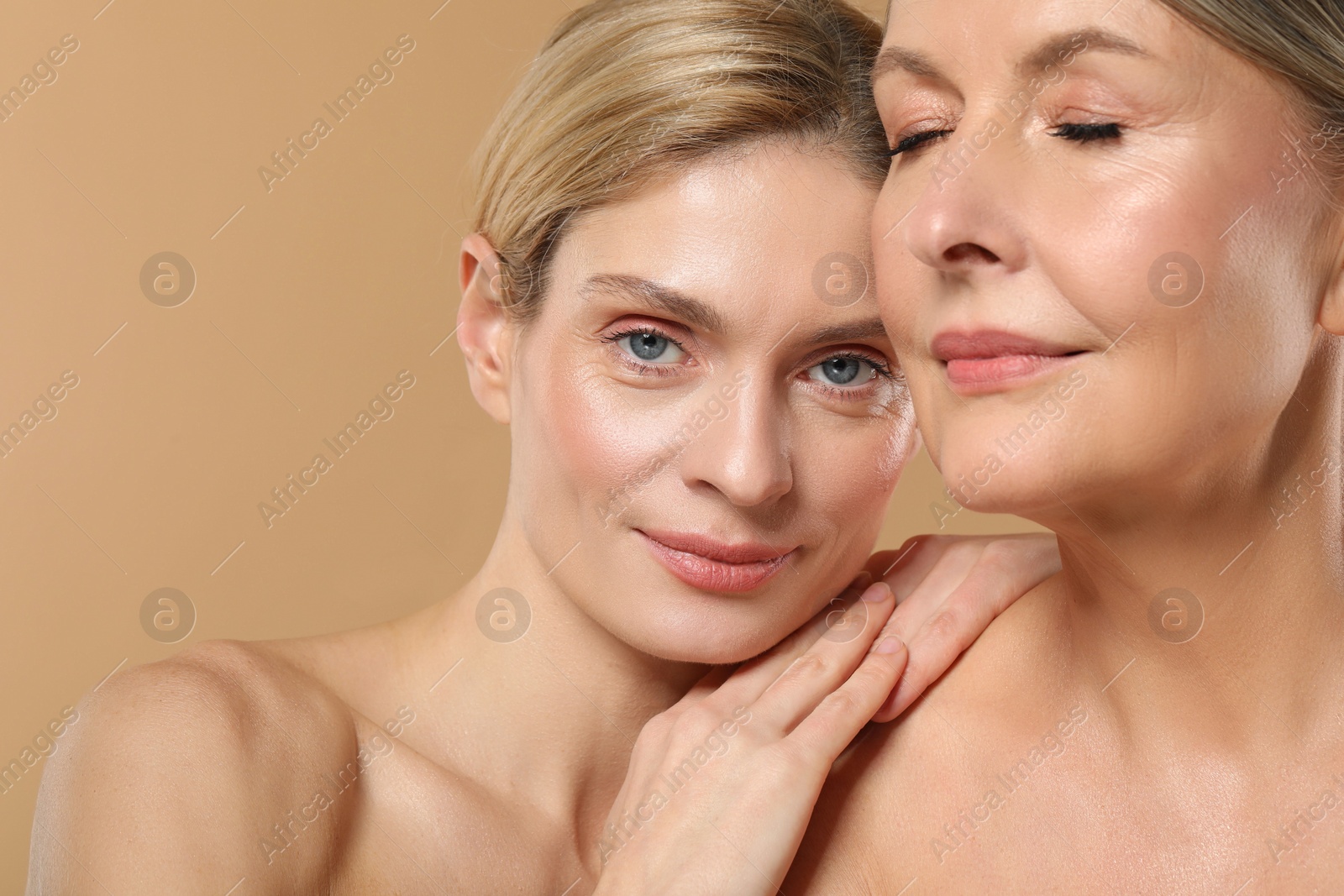 Photo of Beautiful women with healthy skin on beige background