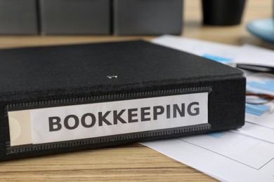 Bookkeeping folder on desk in office, closeup