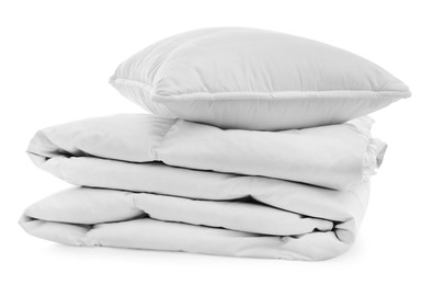 Photo of Soft blanket with pillow on white background