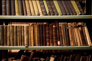 Image of Collection of old books on shelves in library