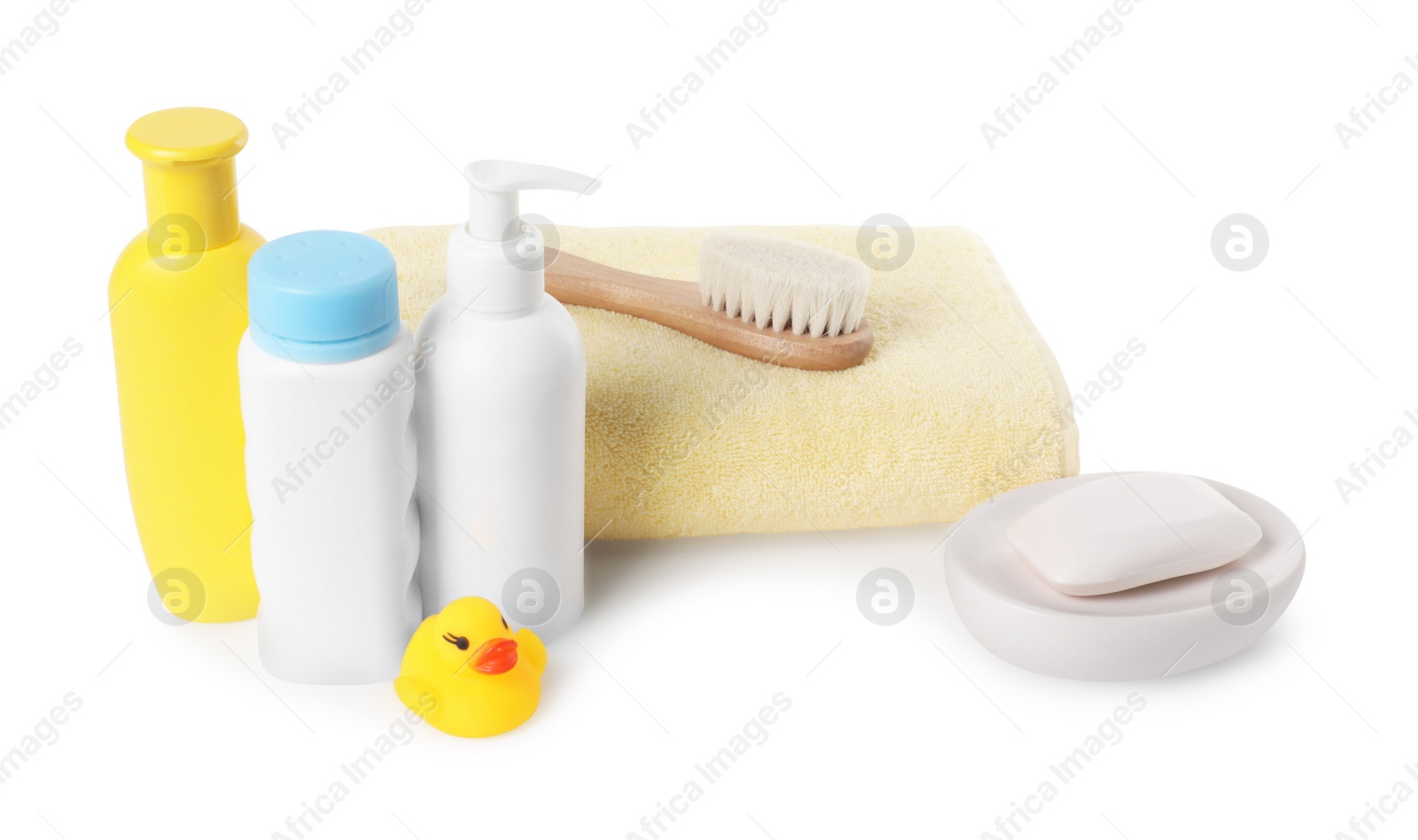 Photo of Baby cosmetic products, bath duck, brush and towel isolated on white