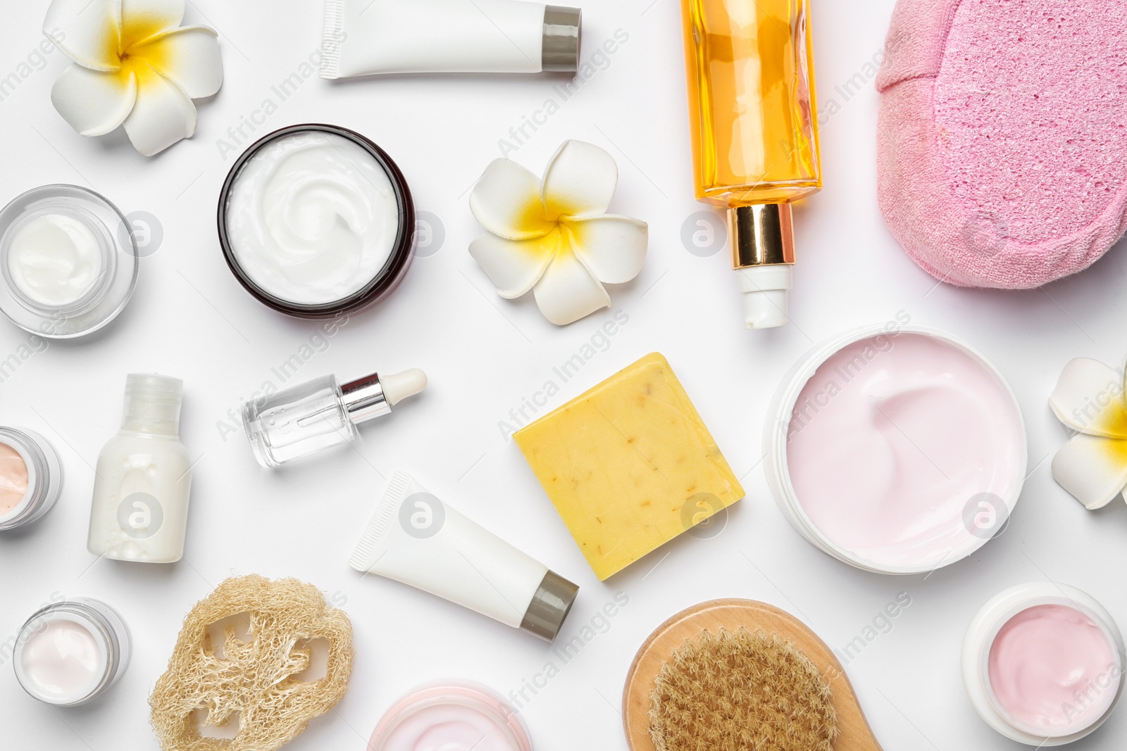 Photo of Flat lay composition with body care products on white background