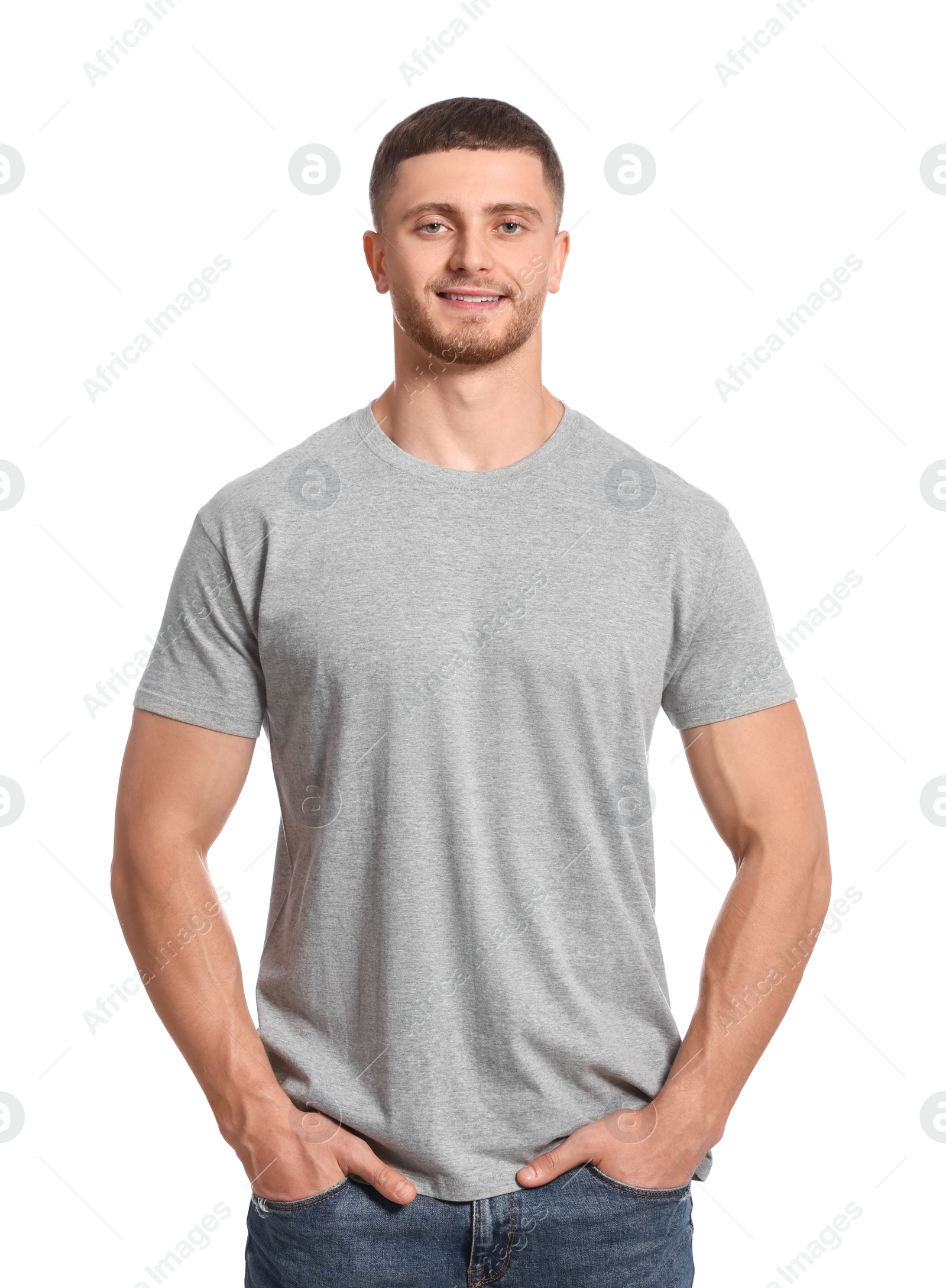 Photo of Man wearing grey t-shirt on white background. Mockup for design