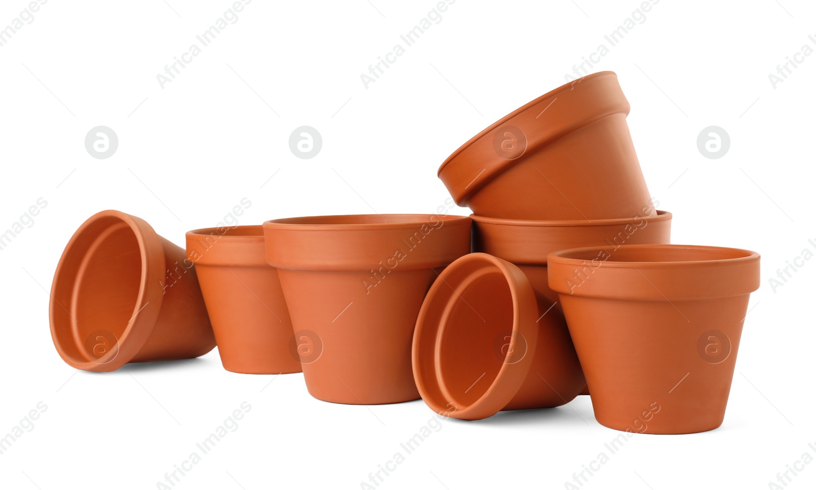 Photo of Empty clay flower pots isolated on white