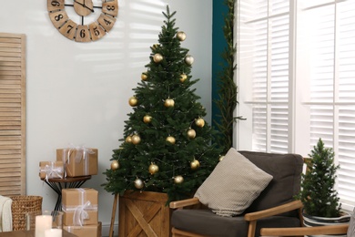 Beautiful decorated Christmas tree in living room