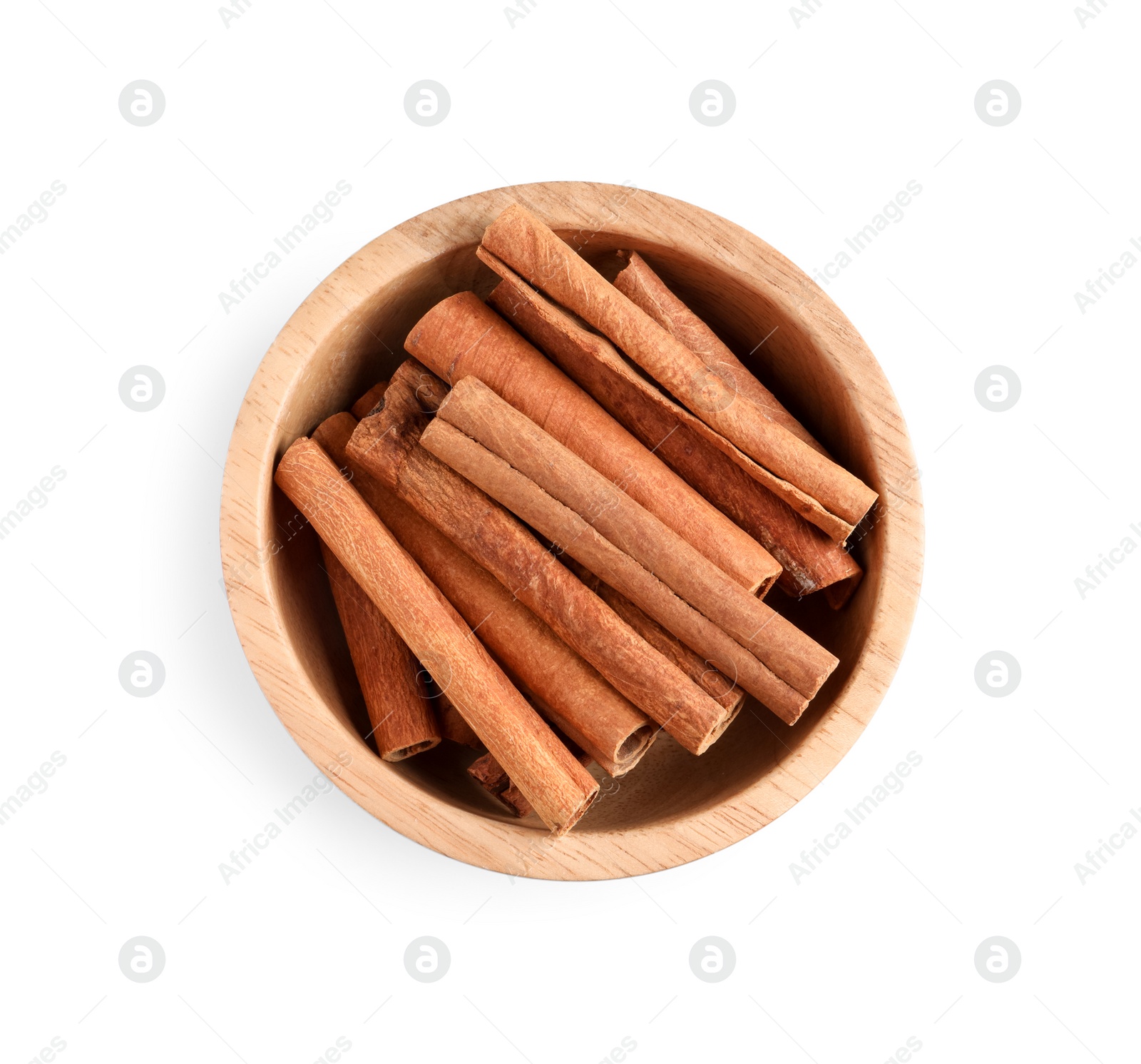 Photo of Cinnamon sticks in bowl isolated on white, top view