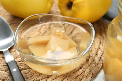 Photo of Delicious quince drink and fresh fruits on table, closeup