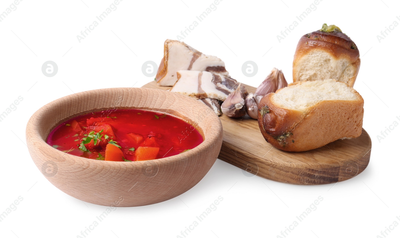 Photo of Delicious borsch served with pampushky and salo on white background. Traditional Ukrainian cuisine