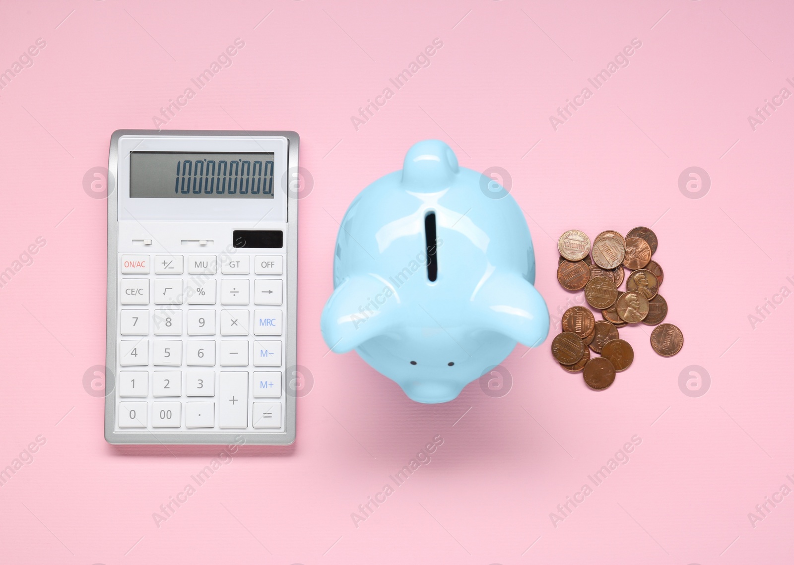 Photo of Calculator, coins and piggy bank on pink background, flat lay