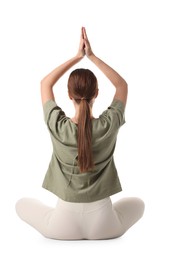 Photo of Young woman meditating on white background, back view