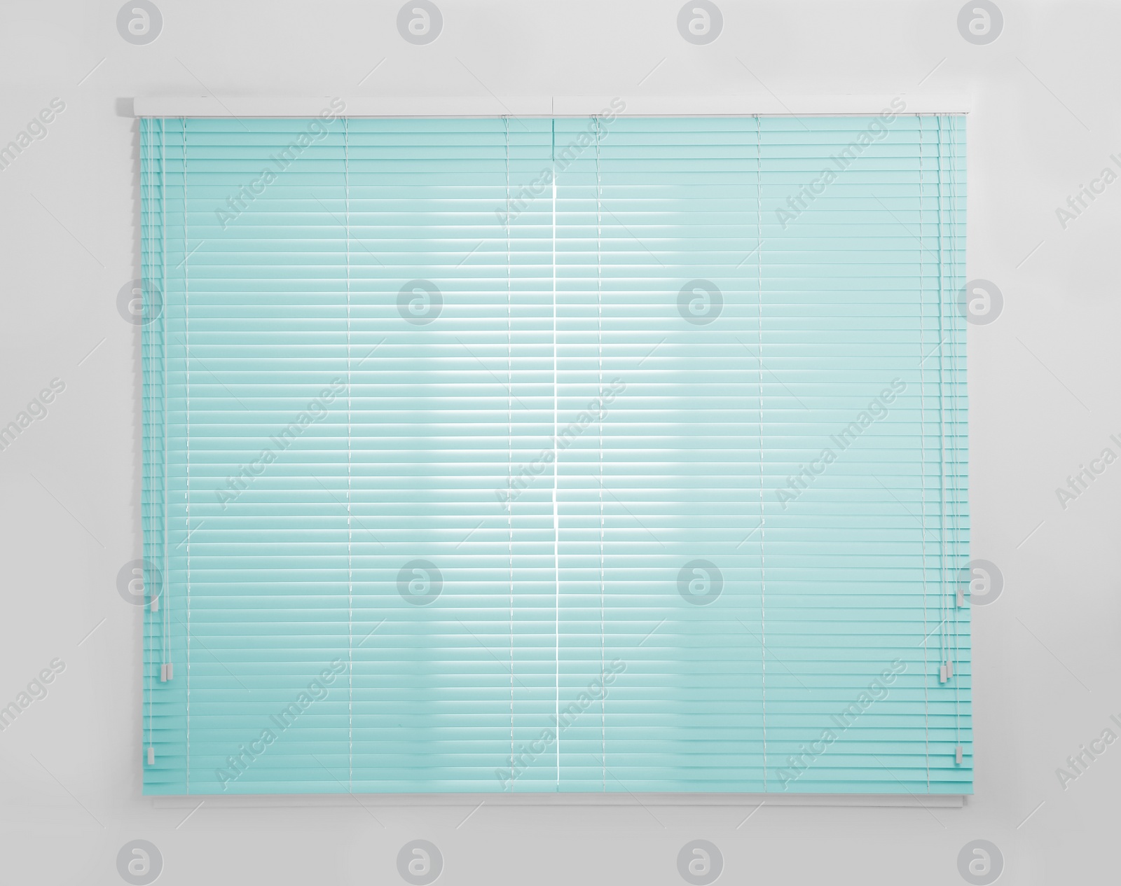 Image of Window with closed turquoise blinds in room