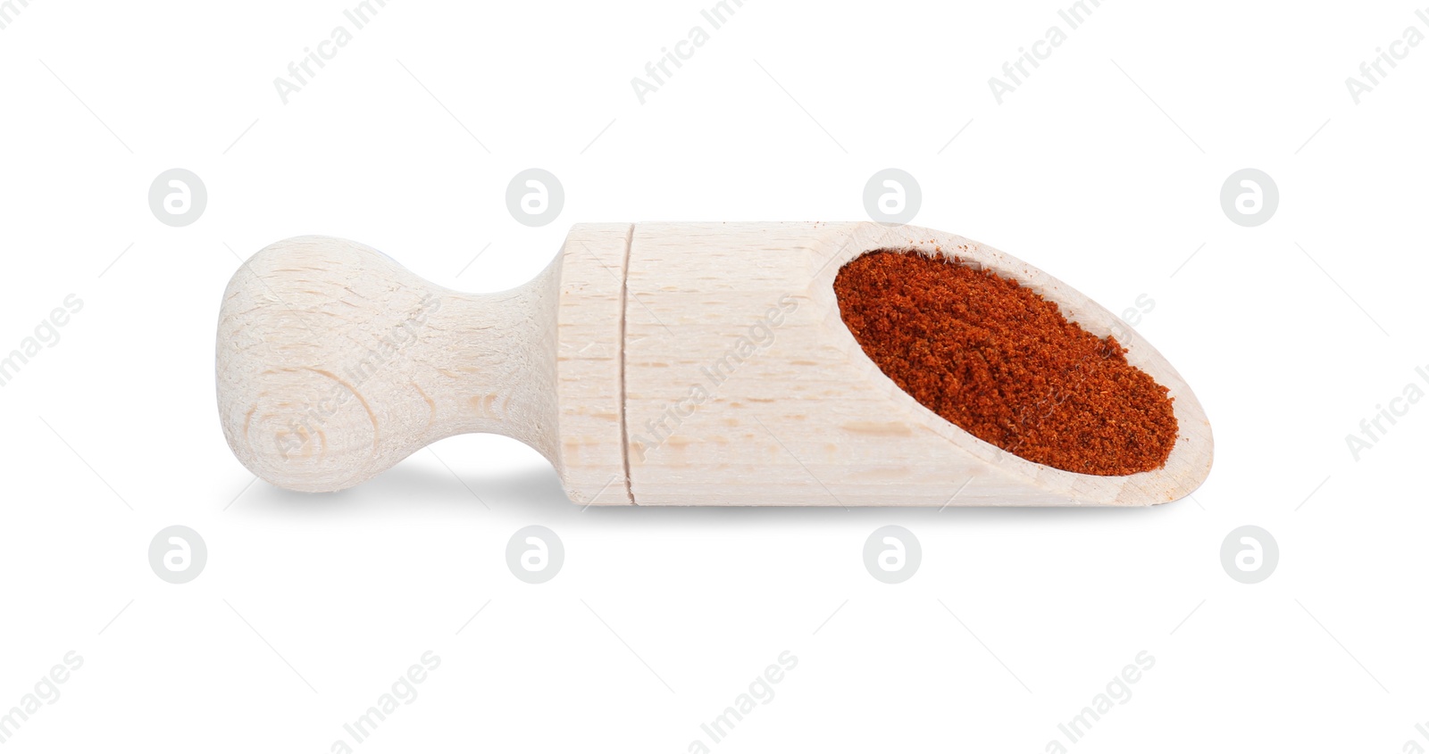 Photo of Scoop of aromatic paprika isolated on white