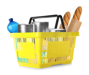 Image of Plastic shopping basket with different products isolated on white 