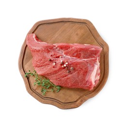 Photo of Piece of raw beef meat with spices and thyme isolated on white, top view