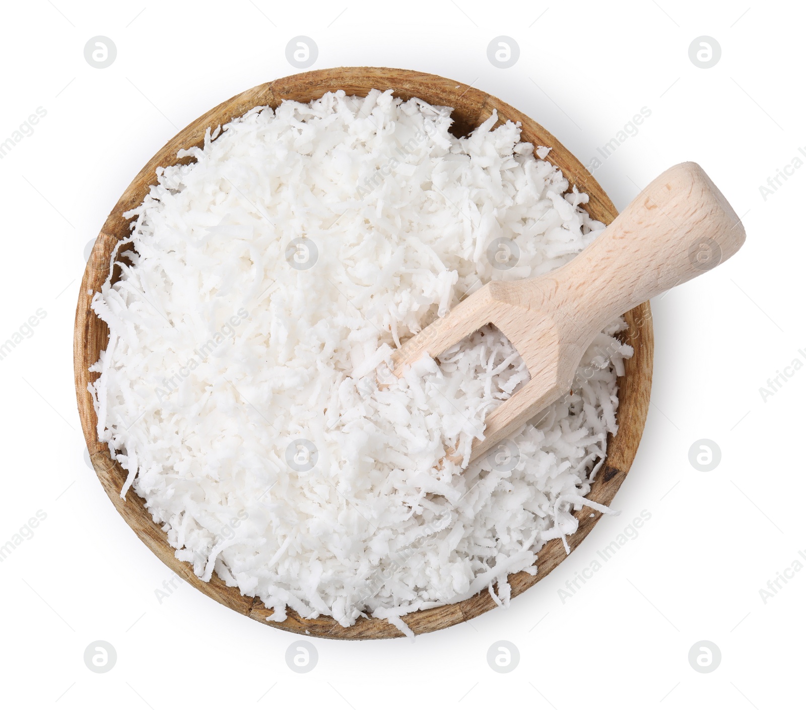 Photo of Coconut flakes in bowl and scoop isolated on white