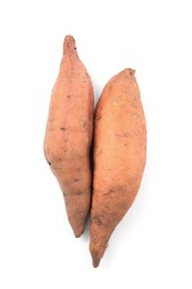 Photo of Whole ripe sweet potatoes on white background, top view