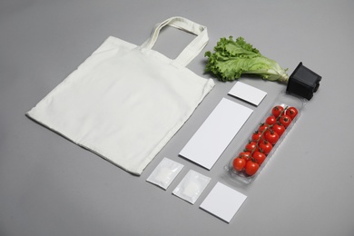 Photo of Composition with items for mock up design on gray background. Food delivery service