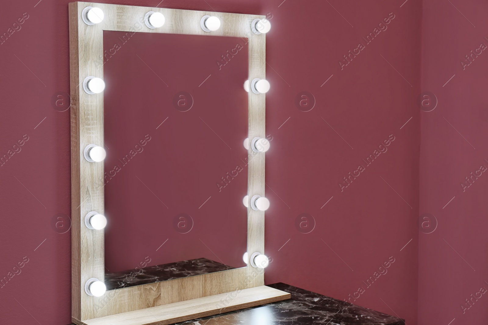 Photo of Beautiful mirror in modern makeup room