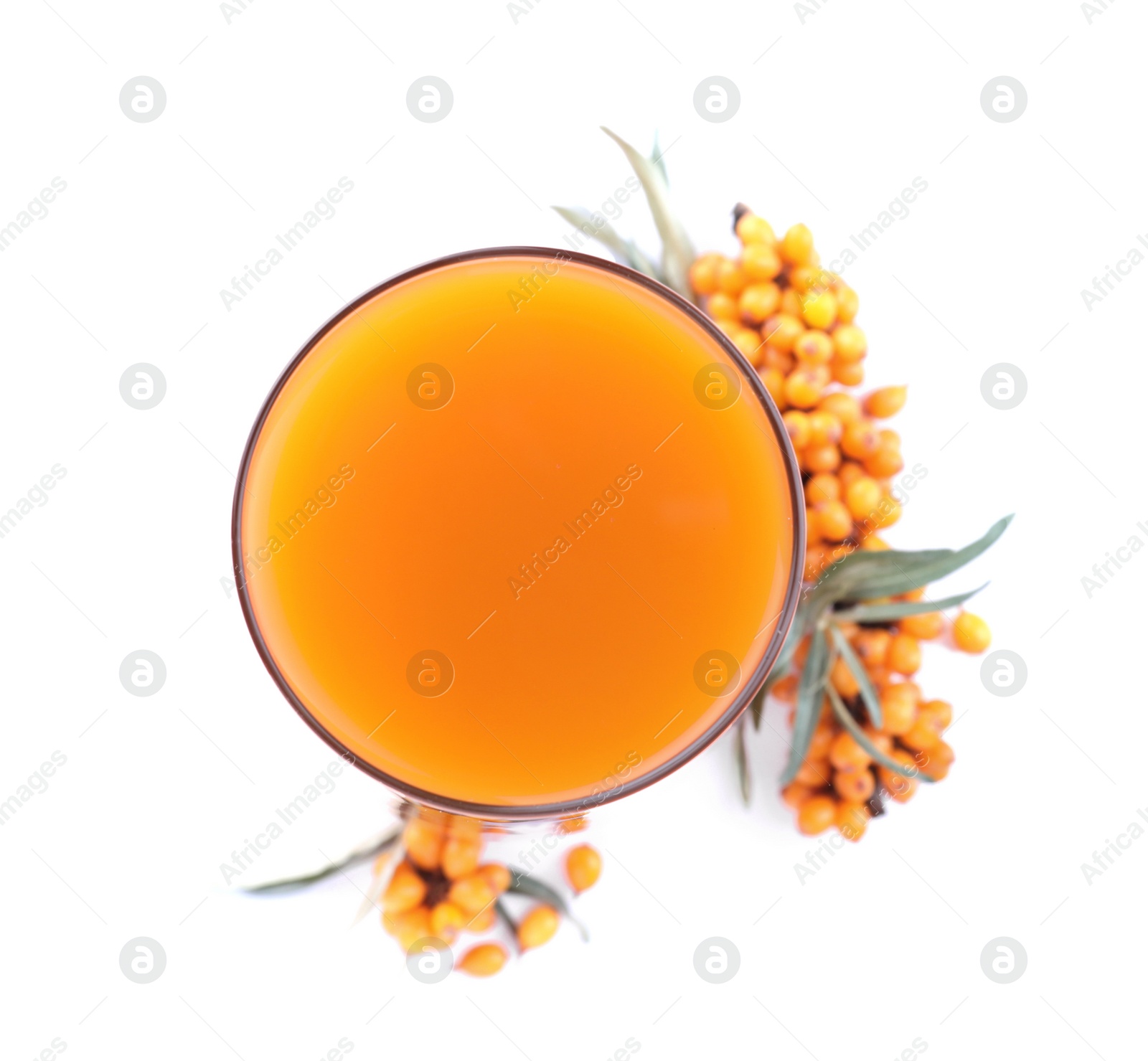 Photo of Delicious sea buckthorn juice and fresh berries isolated on white, top view