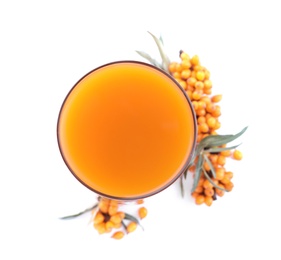 Delicious sea buckthorn juice and fresh berries isolated on white, top view