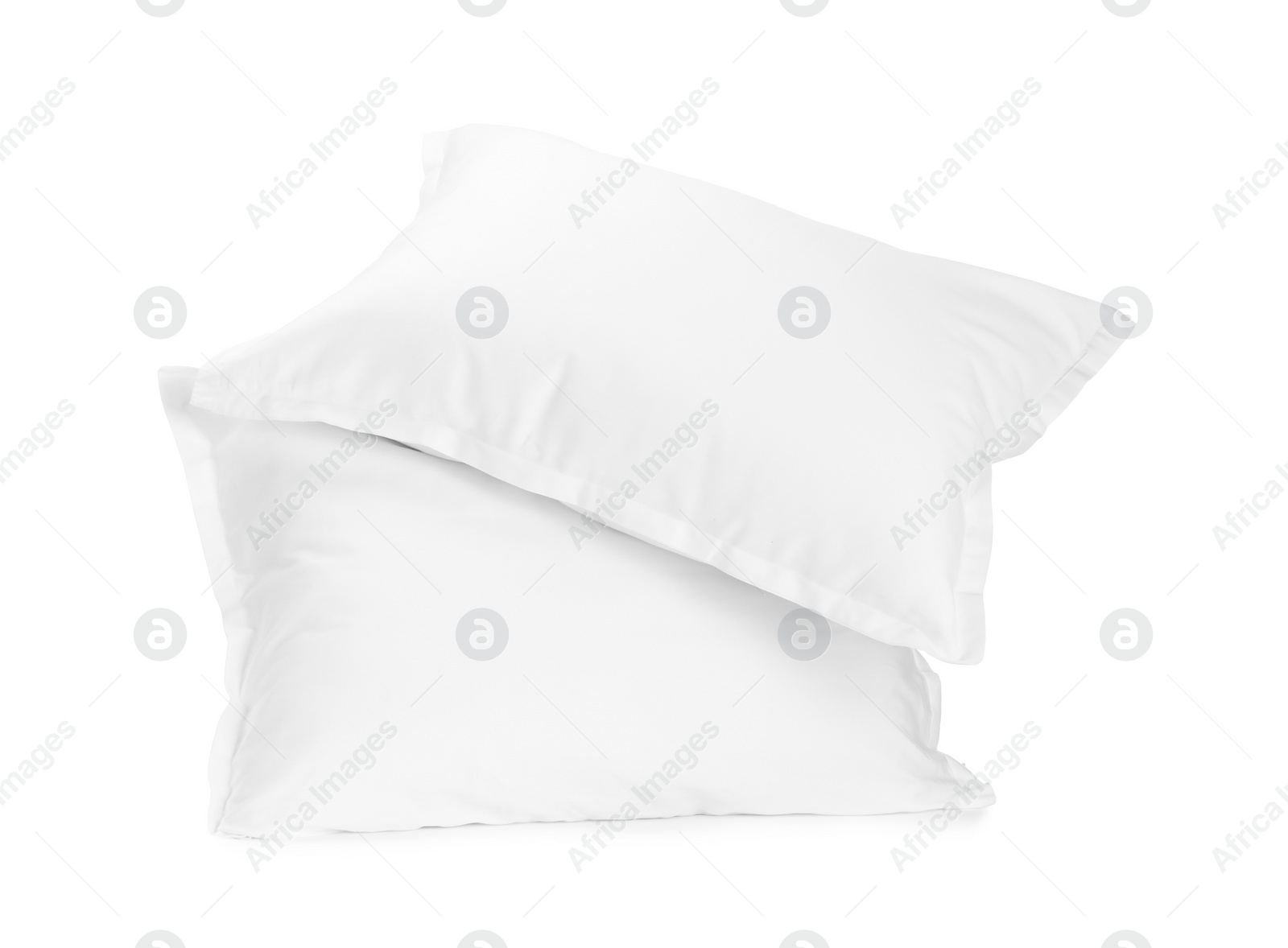 Photo of Two new soft pillows isolated on white