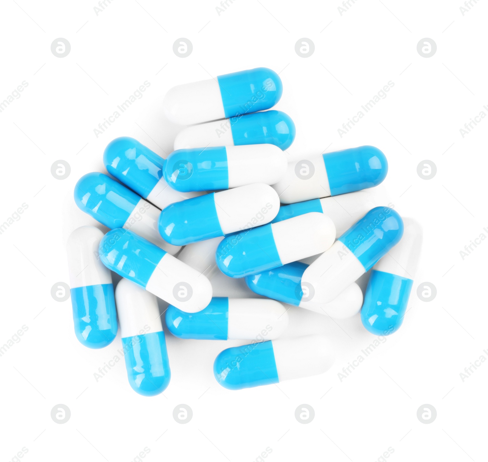 Photo of Pile of antibiotic pills isolated on white, top view