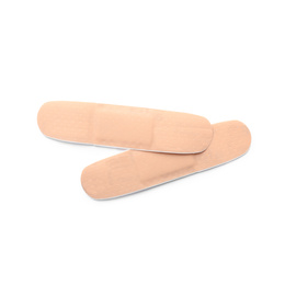 Photo of Medical sticking plasters isolated on white. First aid item