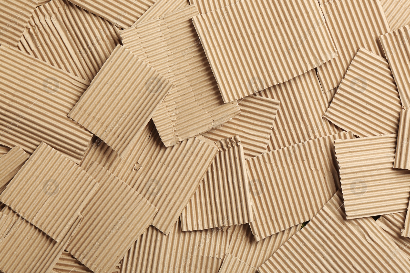 Photo of Pieces of cardboard as background, top view. Recycling concept