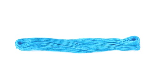 Light blue embroidery thread on white background