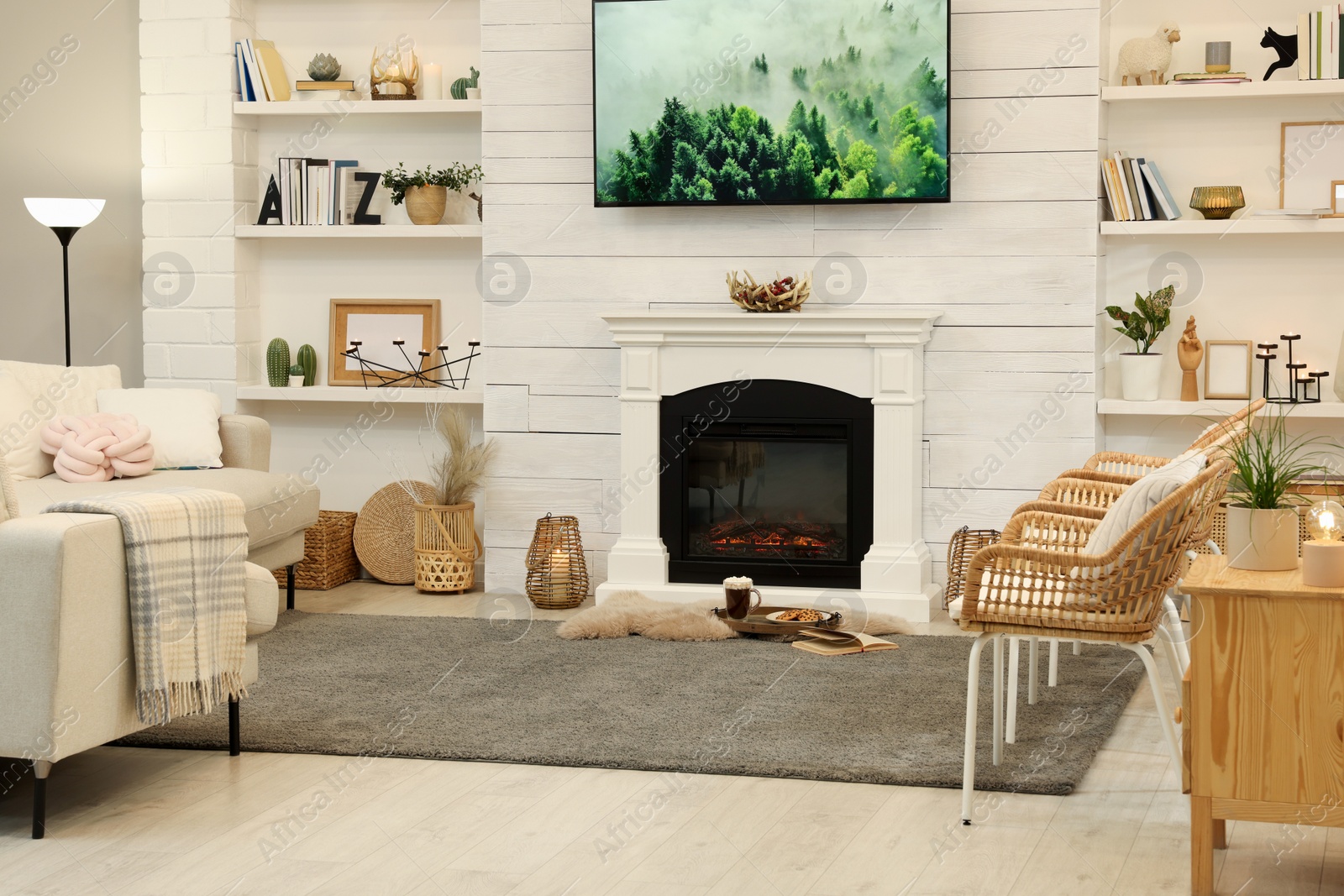 Photo of Cozy living room interior with decorative fireplace