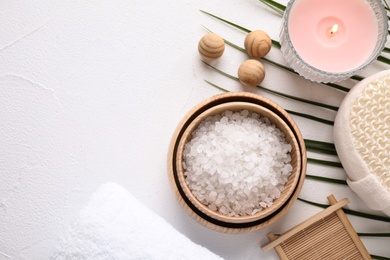 Photo of Flat lay composition with sea salt on white background, space for text. Spa treatment