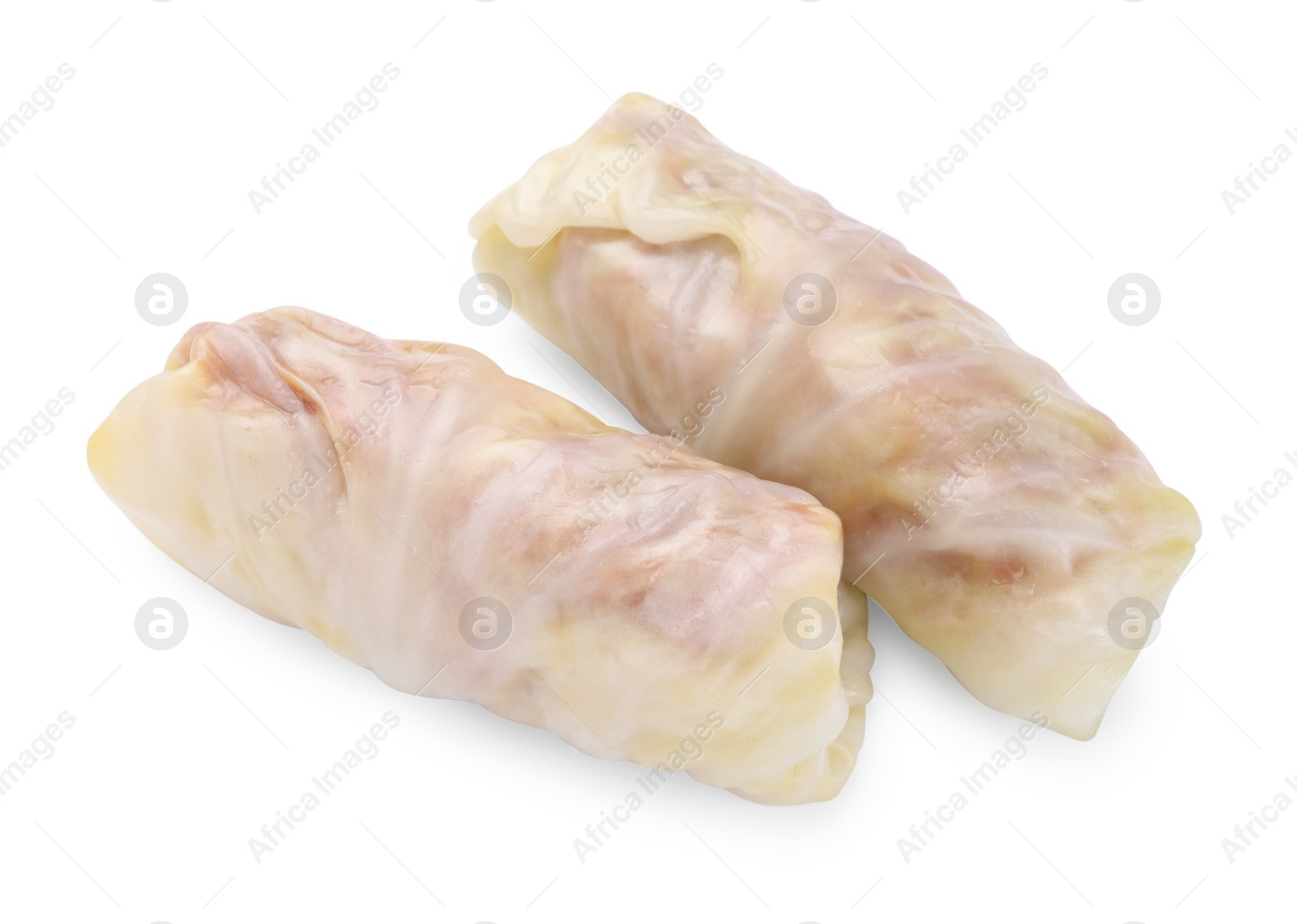 Photo of Uncooked stuffed cabbage rolls isolated on white