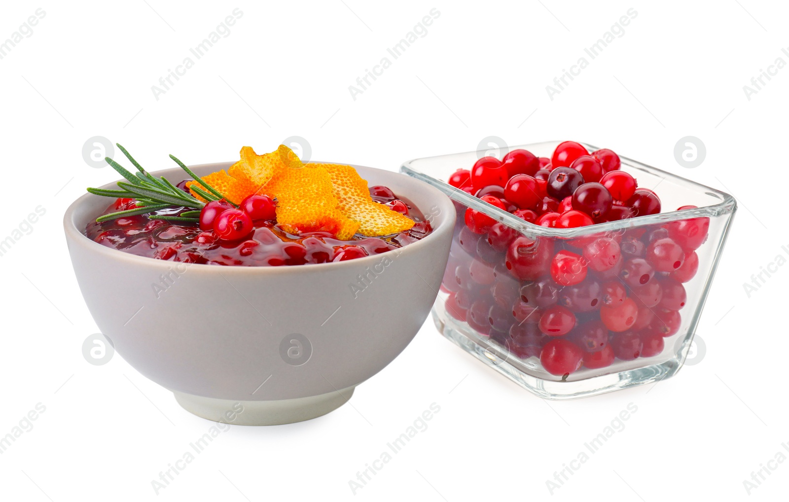 Photo of Fresh cranberry sauce, rosemary, berries and orange peel isolated on white