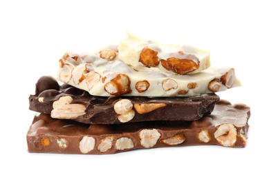 Photo of Different delicious chocolate with nuts on white background