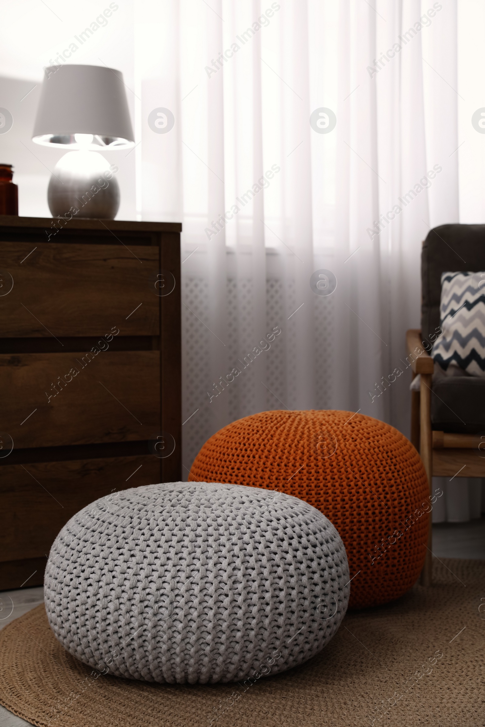 Photo of Stylish comfortable poufs in room. Home design