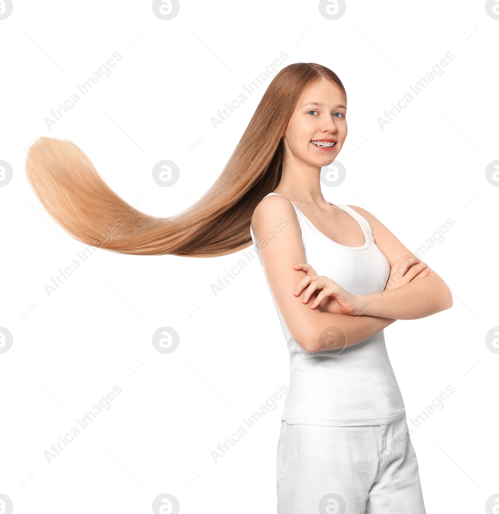 Photo of Teenage girl with strong healthy hair on white background