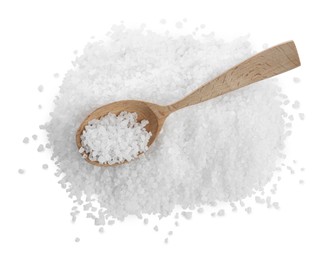 Pile of natural sea salt and wooden spoon on white background, top view