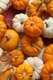 Photo of Thanksgiving day. Flat lay composition with pumpkins on table