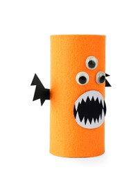 Monster made of orange felt isolated on white. Halloween decoration